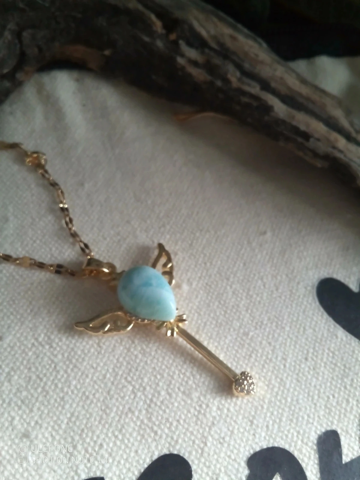 Colar chave com asa de pedra de larimar – photo 3